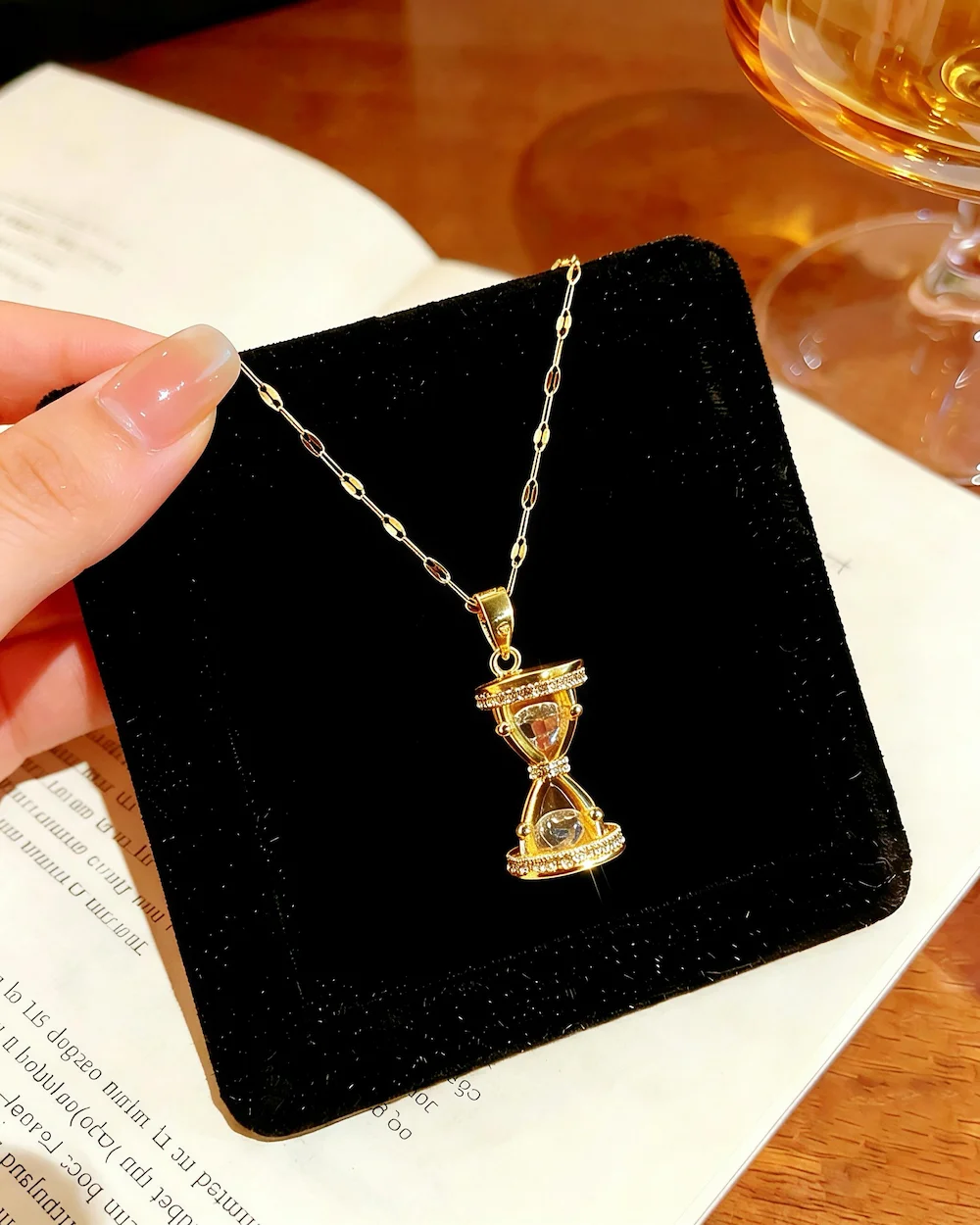 Eternal Sands Hourglass Zircon Inlaid Copper and Titanium Steel Necklace in Gold